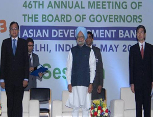 Indian Prime Minister Manmohan Singh flanked by Asian Development Bank President Takehiko Nakao and Finance Minister P. Chidambaram during the ADB 46th Annual Meeting of the Board of Governors at India Expo Centre and Mart, Greater Noida, Delhi